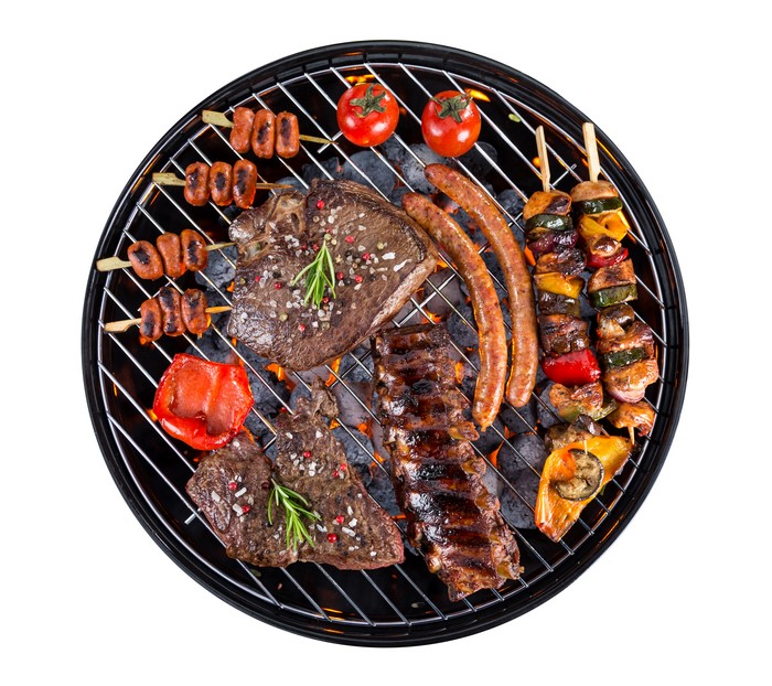 Barbecue Grill with Steaks, Sausages, and Skewers