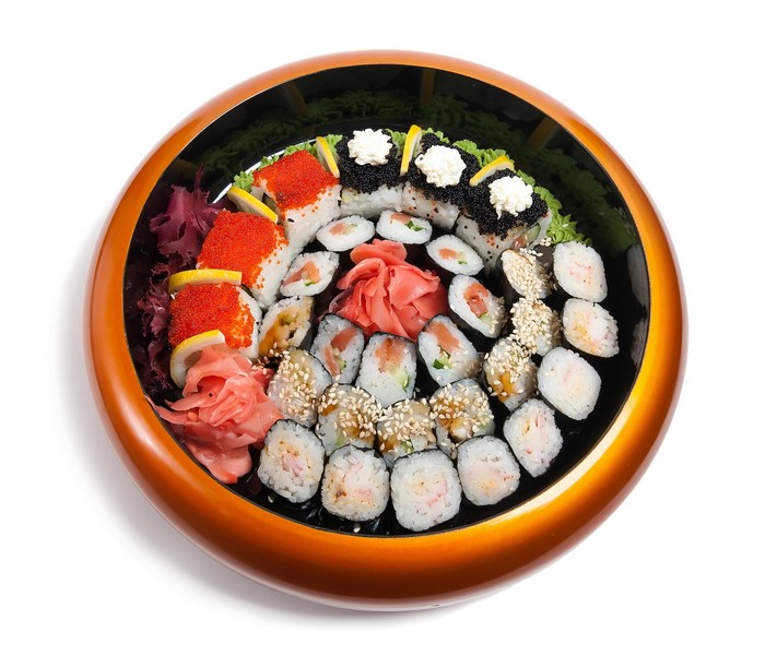 Assorted sushi platter with caviar and pickled ginger