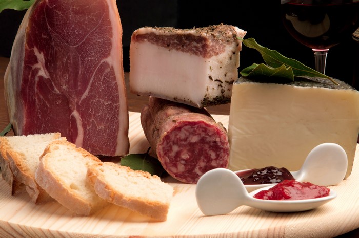 Meat products, ham, sausage, bread, cheese, and salo