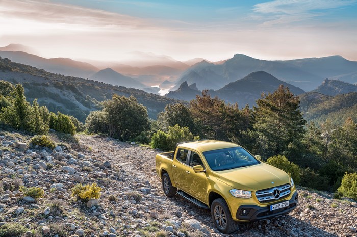 Yellow Mercedes-Benz X-Klasse Pickup in Mountains