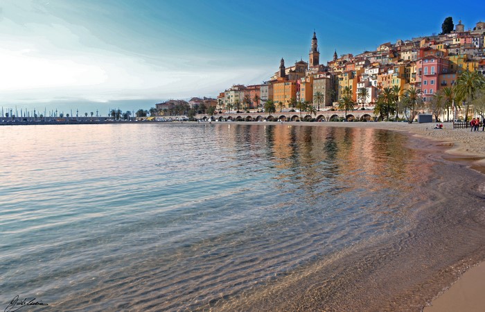Menton, France houses on a coast with a bay