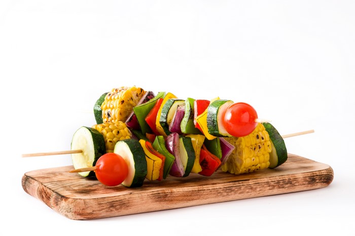 Vegetable shashlik on a cutting board