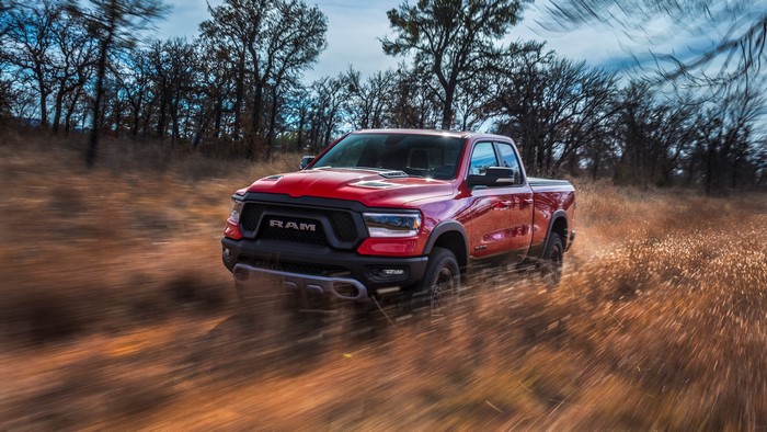 Red 2019 Ram 1500 Rebel Quad Cab driving off-road