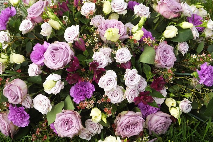 Purple and White Roses and Carnations Floral Arrangement
