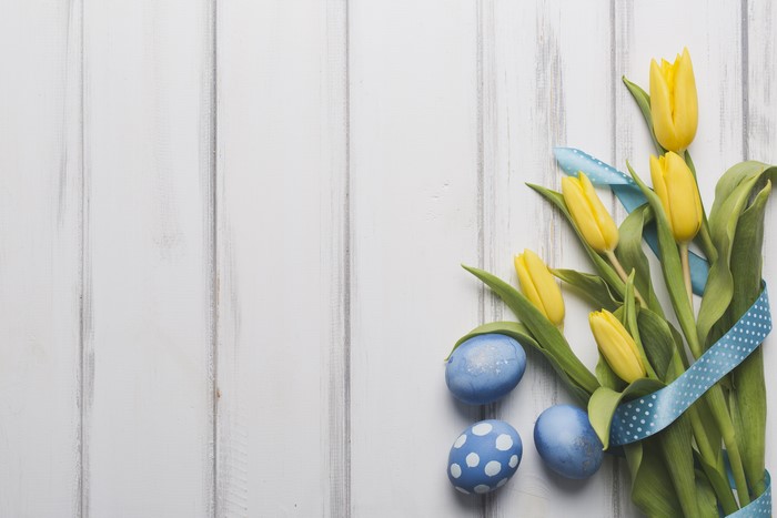 Yellow Tulips and Blue Easter Eggs with Ribbon