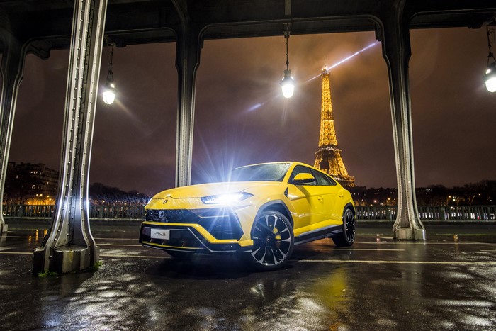 Yellow Lamborghini Urus in Paris at Night