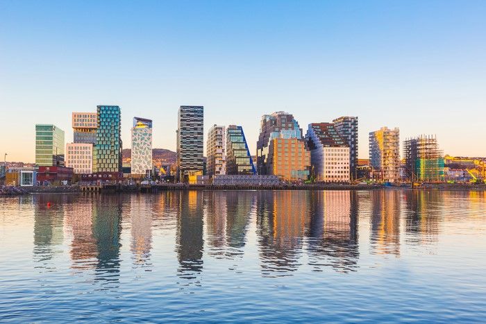 Oslo skyline with modern buildings and water reflection