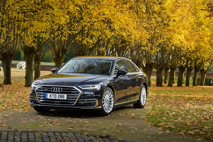 Black Audi A8 50 TDI quattro in autumn