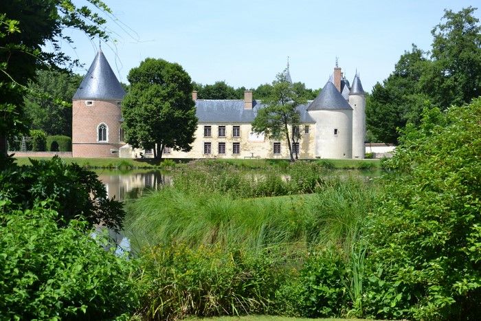 Château de Chamerolles, France, with pond and trees