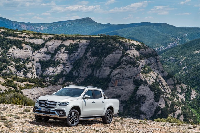 White Mercedes-Benz X-Klasse Pickup in Mountains