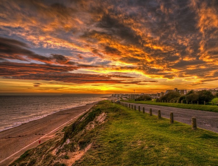 Sunset over the coast of Rother District, England