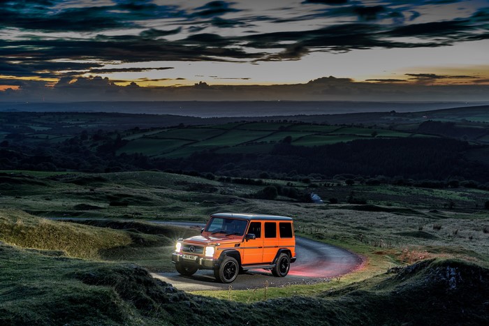 Orange Mercedes-Benz AMG G 63 Colour Edition on a road