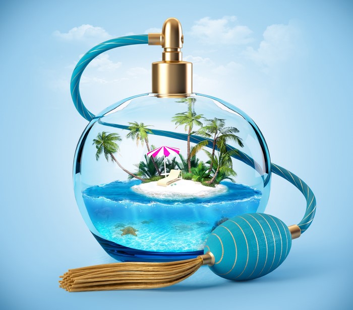 Perfume bottle with tropical island inside