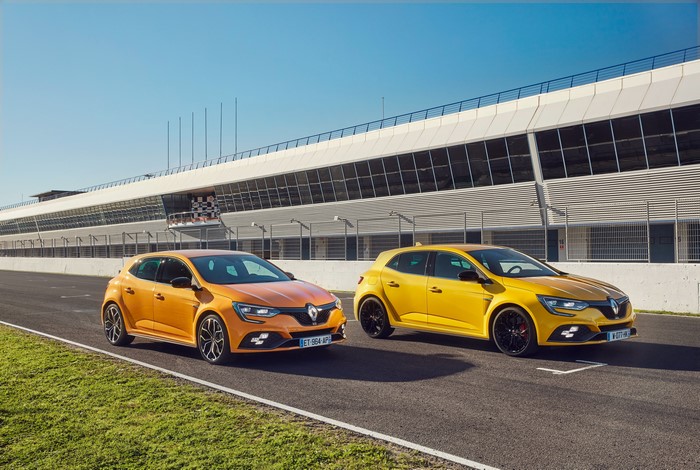 Two Renault Megane RS cars on a racetrack