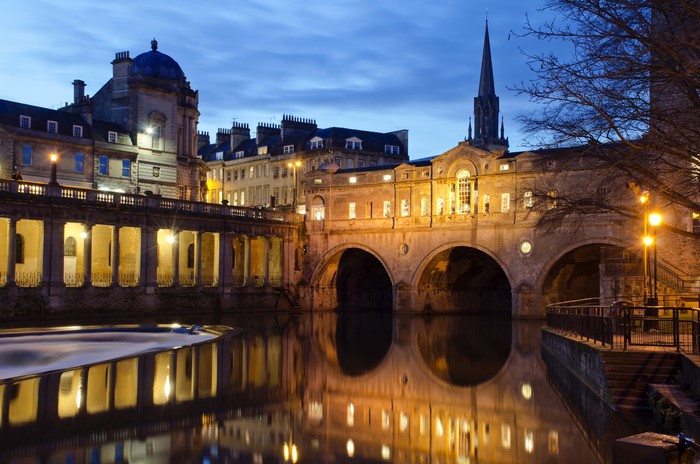 Pulteney Bridge and River Avon at dusk in Bath, England