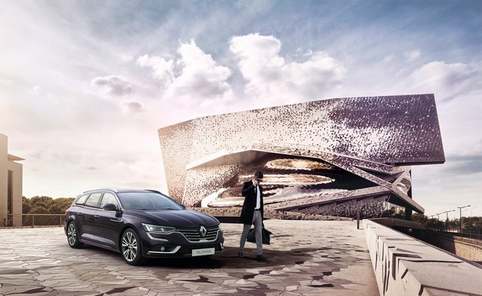 Renault Talisman Estate Initiale Paris in front of modern building