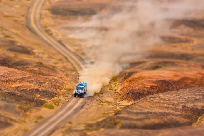KAMAZ truck in Silk Way rally kicking up dust