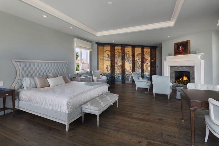 Luxury Bedroom with Fireplace and Asian Screen