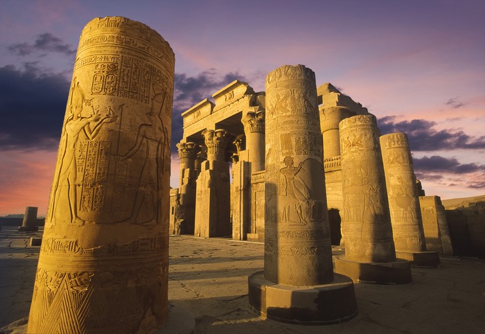 Temple of Kom Ombo ruins with columns at sunset, Egypt