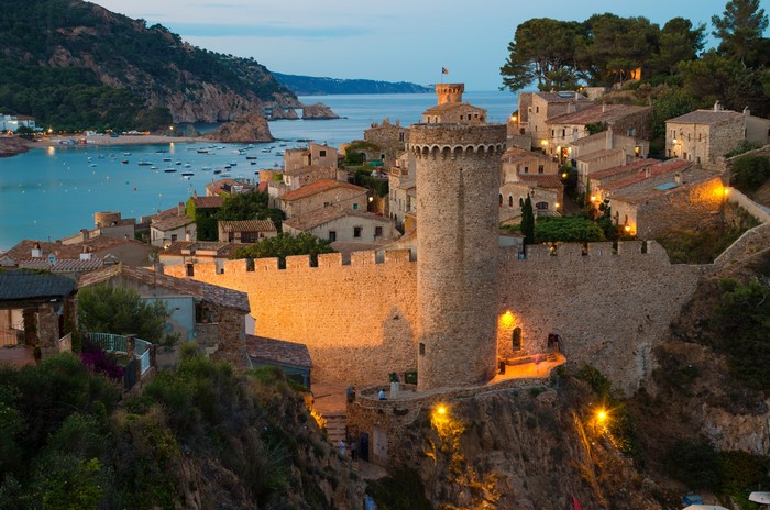 Fortress and houses in Tossa de Mar, Catalonia, Spain at evening