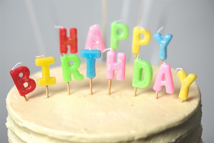 Happy Birthday candles on a cake