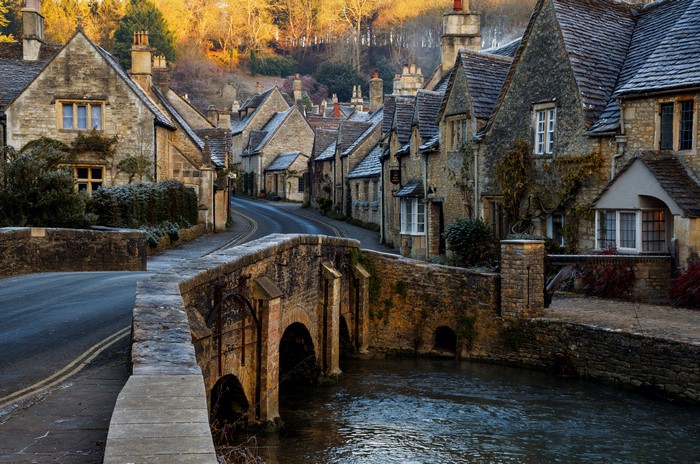 Castle Combe village with bridge and river in England
