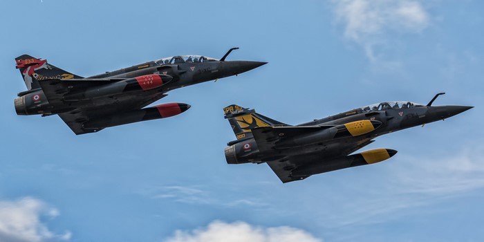 Two Dassault Mirage 2000D fighter jets in flight