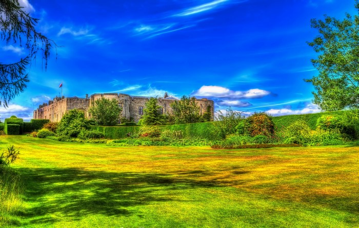 Chirk Castle with manicured gardens and lawn