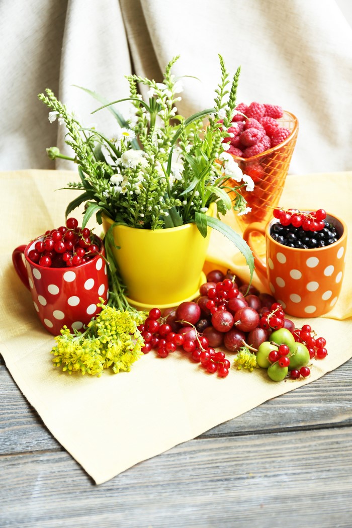 Still life with berries and flowers