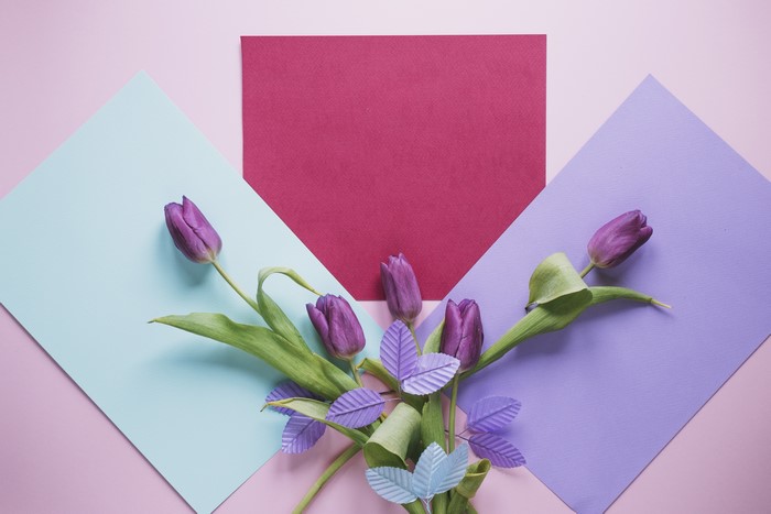 Purple Tulips on Geometric Paper Background