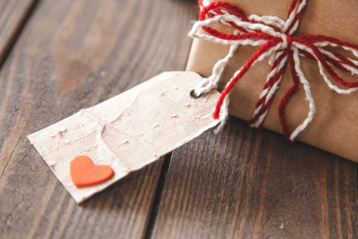 Gift with heart tag and red and white twine