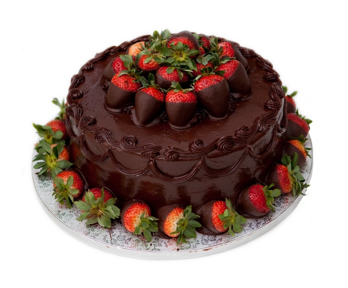 Chocolate cake with chocolate-dipped strawberries