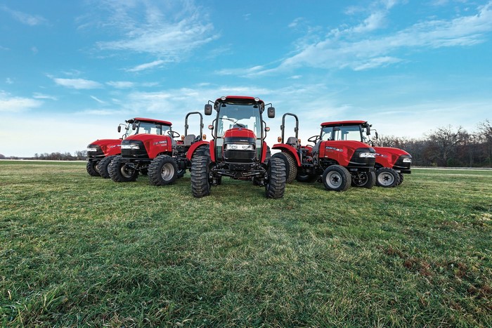 Case IH Farmall C Tractors in a Field