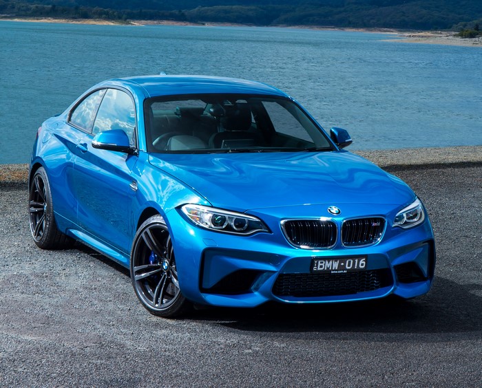 Blue 2016 BMW M2 Coupe by a Lake