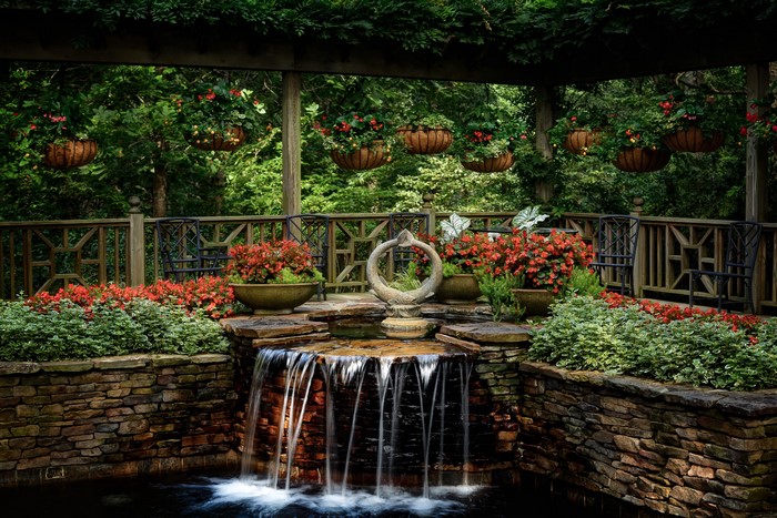 Gibbs Gardens Waterfall with Begonias and Fence