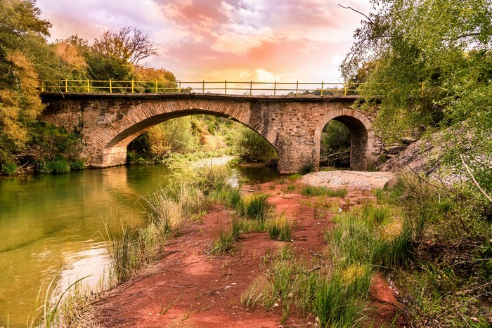 Stone bridge over a river in Greece