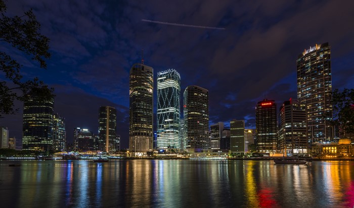 Brisbane skyline at night with river reflections