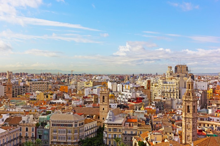 Cityscape of Valencia, Spain with historic buildings and blue sky