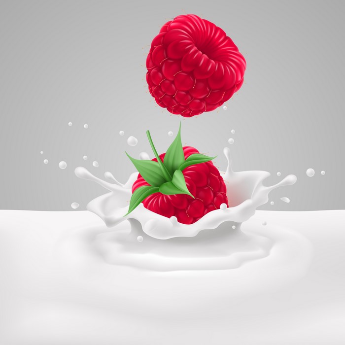 Raspberry splashing into milk
