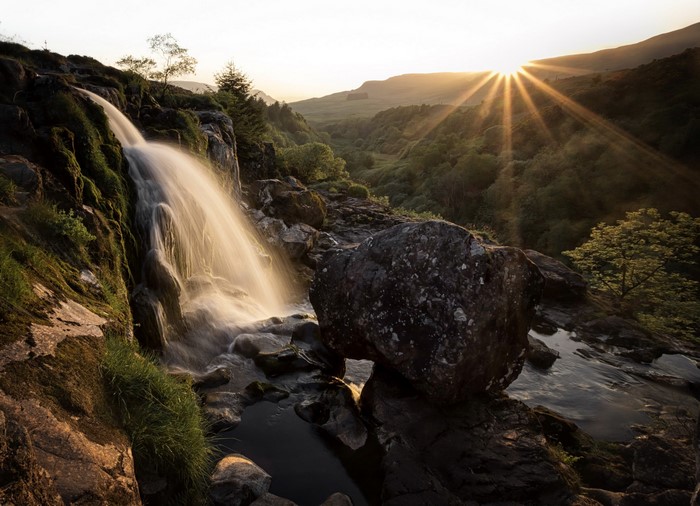 Scotland Waterfall at Sunrise with Rays of Light