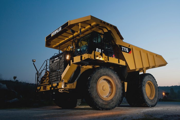 Caterpillar 777G mining truck at dusk