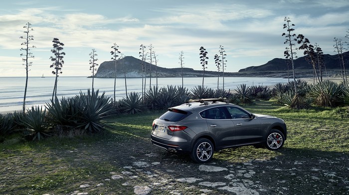 Grey 2016 Maserati Levante on a beach