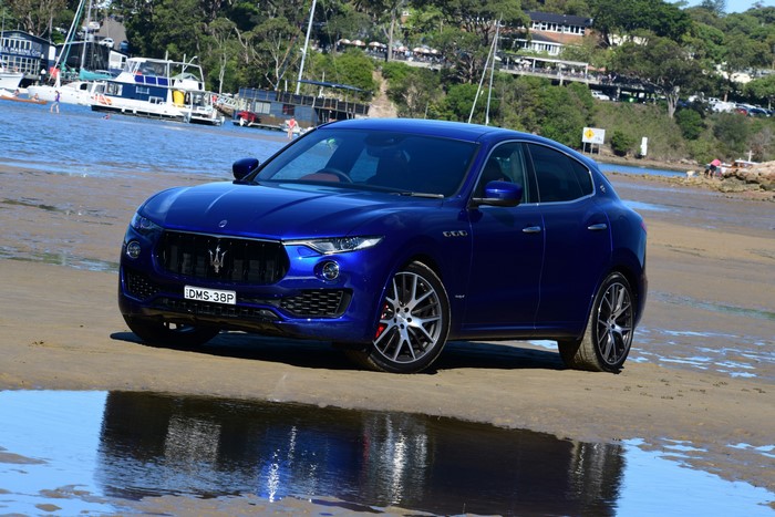 Blue Maserati Levante S Q4 GranSport on a beach