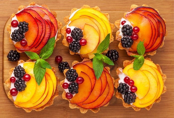Fruit tarts with blackberries and currants