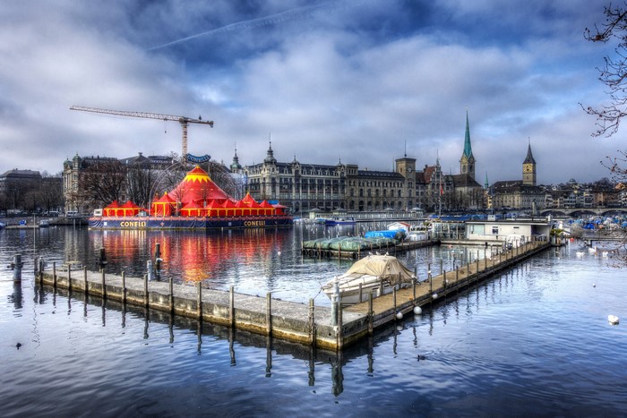 Circus tent on Lake Zurich with city skyline