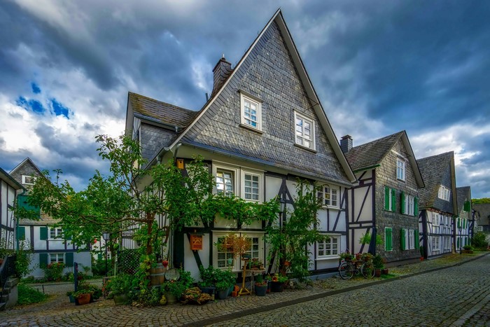 Half-timbered houses and cobblestone street in Freudenberg, Germany