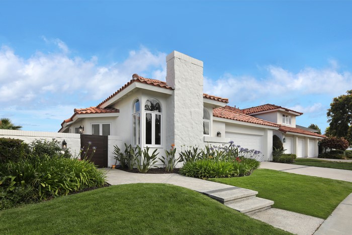 White Mediterranean House with Tile Roof in Dana Point