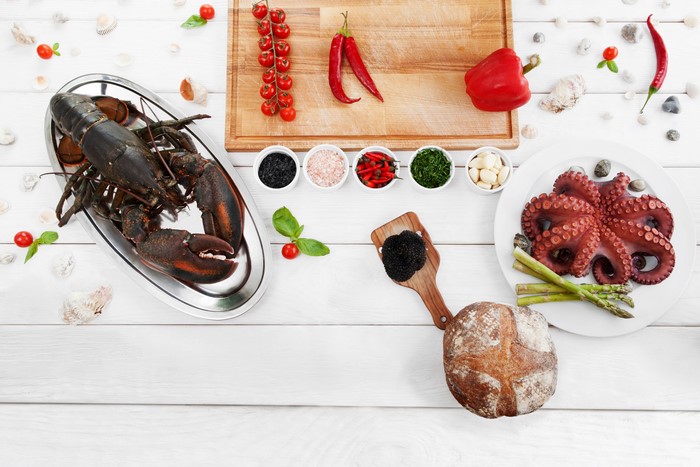 Lobster and Octopus Seafood Platter with Spices and Vegetables