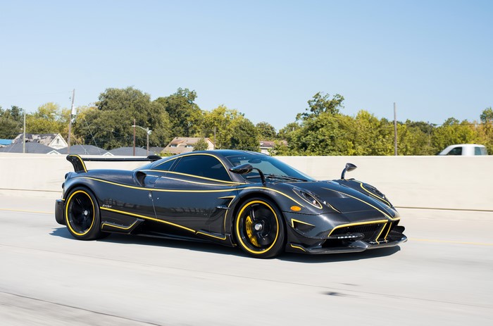 Pagani Huayra BC with yellow accents on highway