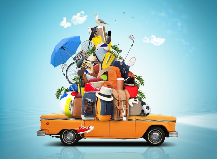 Taxi overloaded with luggage and travel items